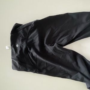Lululemon capris with mesh details on the outer side of the left and right calf